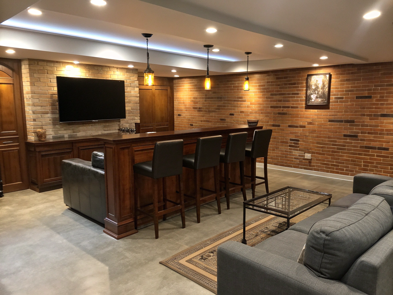 Finished basement recreation room with custom lighting